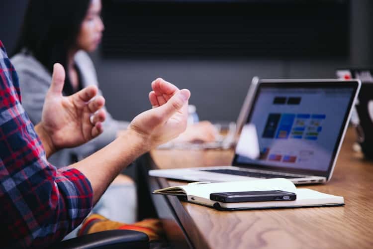 Business owner comparing Australian business loan options online